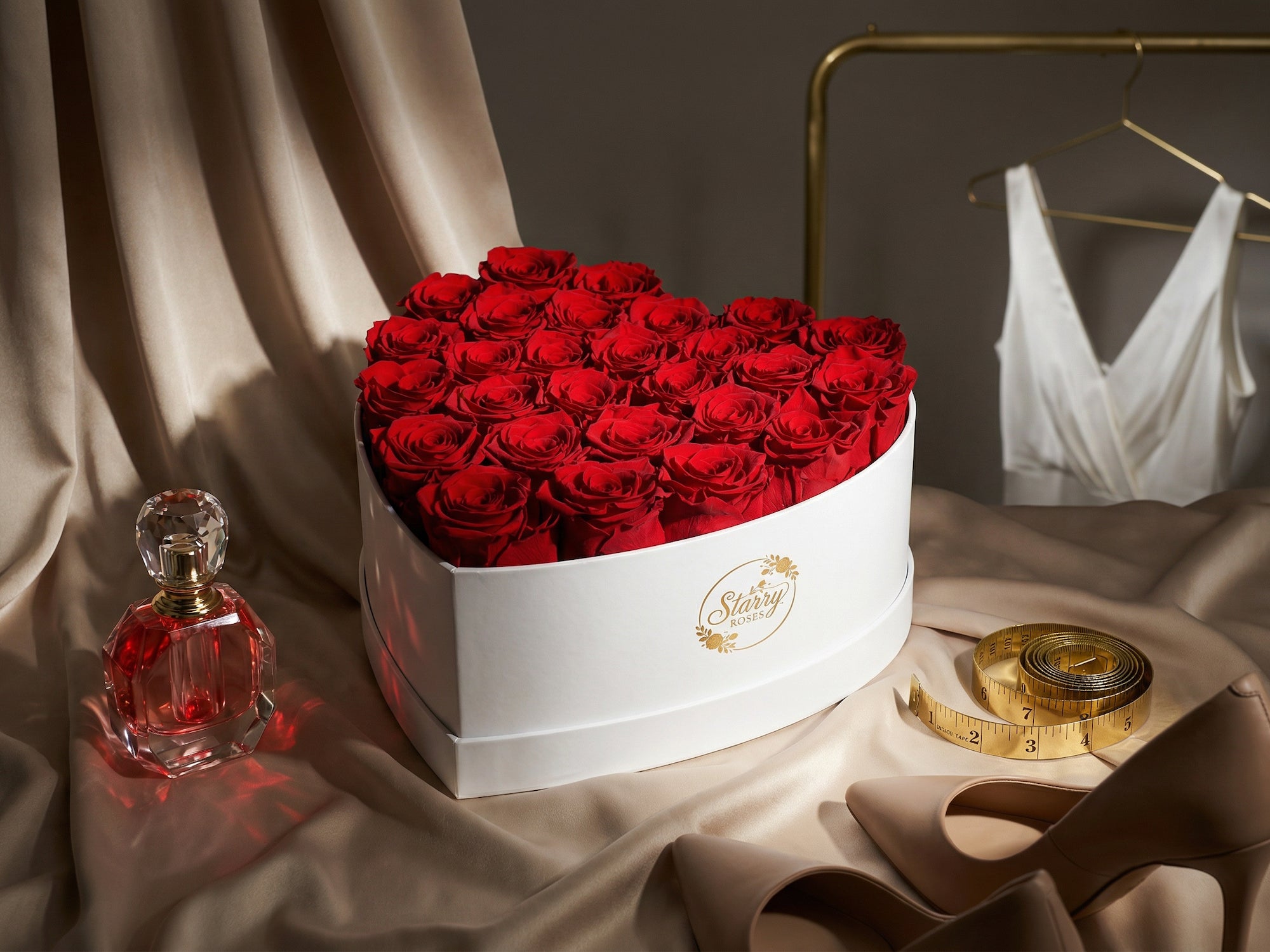Large Heart White Box Red Forever Roses as a luxury gift displayed in a rich interior setting. Lifestyle photo showing a perfect gift for anniversaries and special occasions.