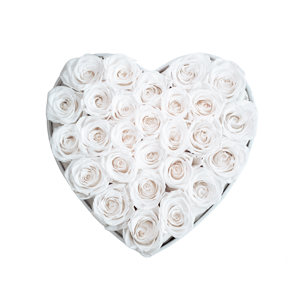 Large Heart White Box White Forever Roses flat lay overhead view.
