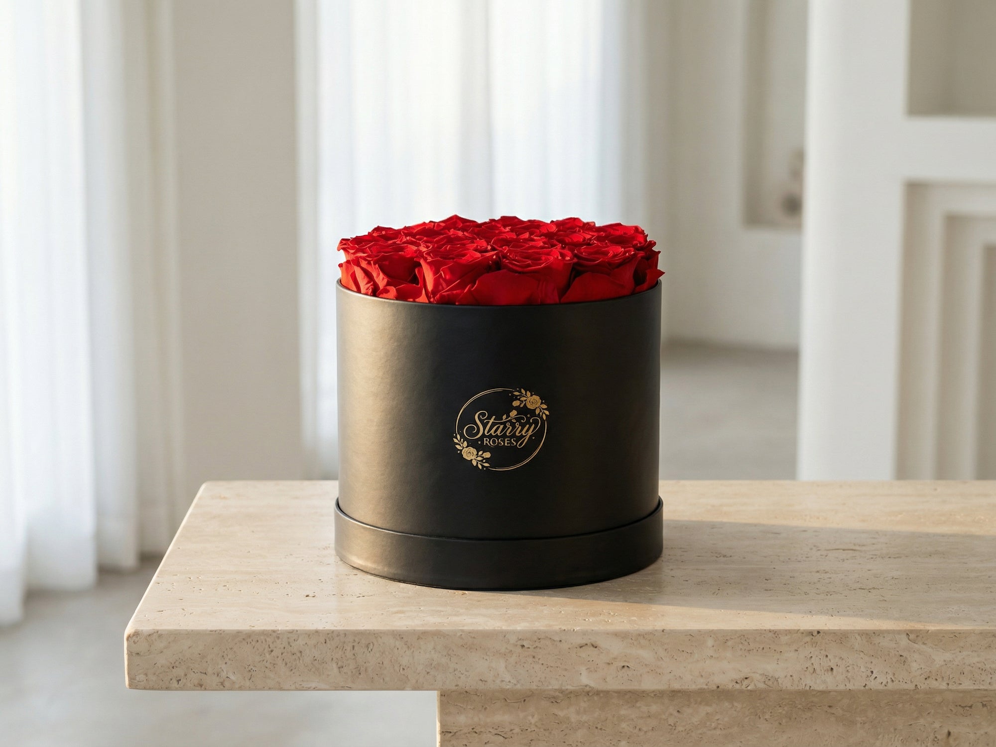 Large Round Black Box Red Forever Roses as a luxury gift displayed in a rich interior setting. Lifestyle photo showing a perfect gift for anniversaries and special occasions.