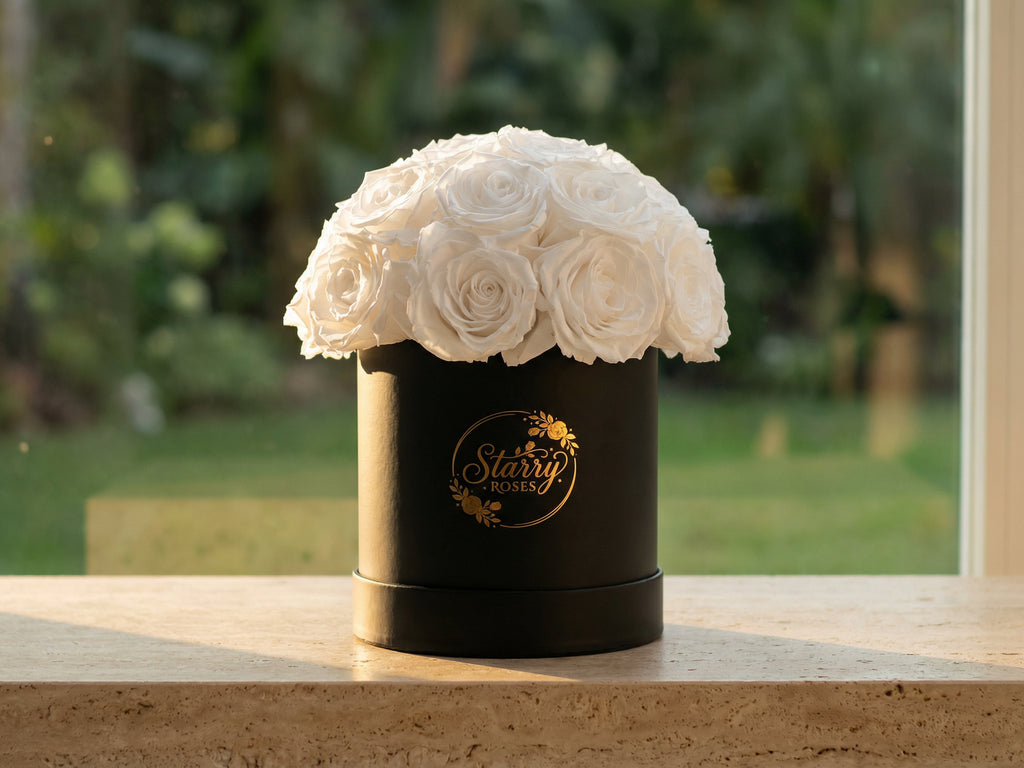 Large Superdome Black Box White Forever Roses as a luxury gift displayed in a rich interior setting. Lifestyle photo showing a perfect gift for anniversaries and special occasions.