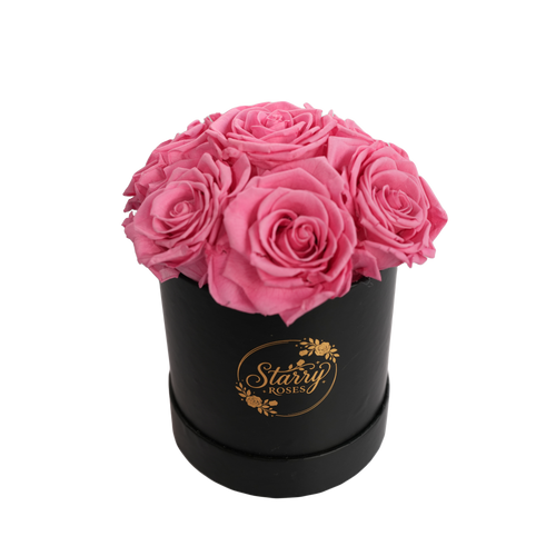 Small Round Black Box Pink Forever Roses product display on white background.
